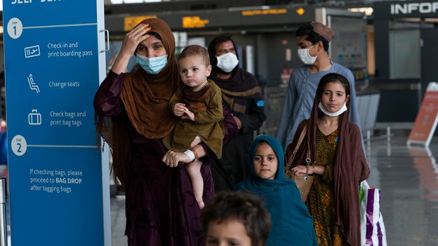 US forces continue evacuations from Kabul's airport under heightened security