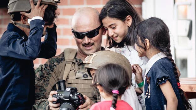 U.S. Marine interacts with Afghan children