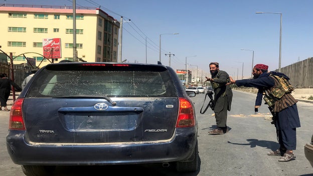 Taliban fighters going house to house in Kabul
