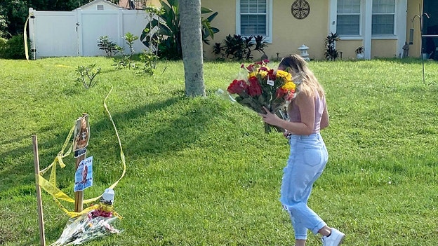 People deliver flowers dedicated to Gabby Petito to Laundrie home