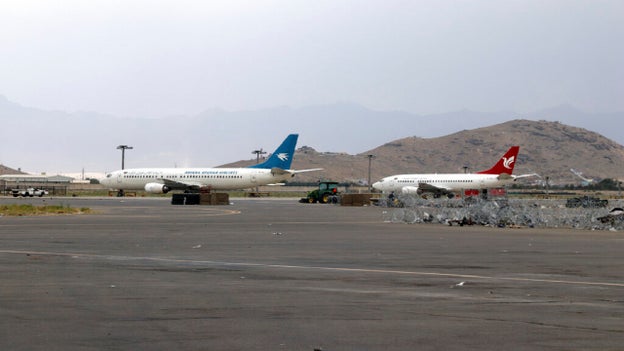 Looting, damage at Kabul airport is going to delay its reopening, official says
