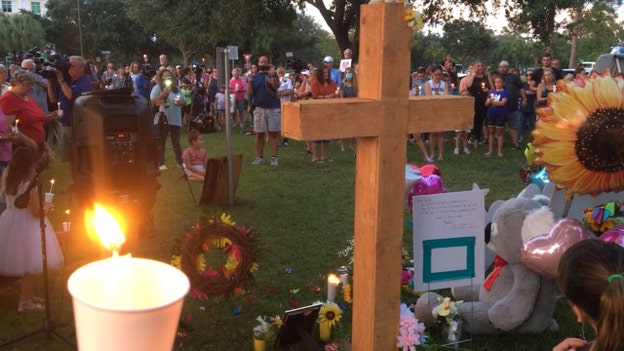Mourners hold candlelight vigil for Gabby in Laundrie's Florida hometown on Saturday