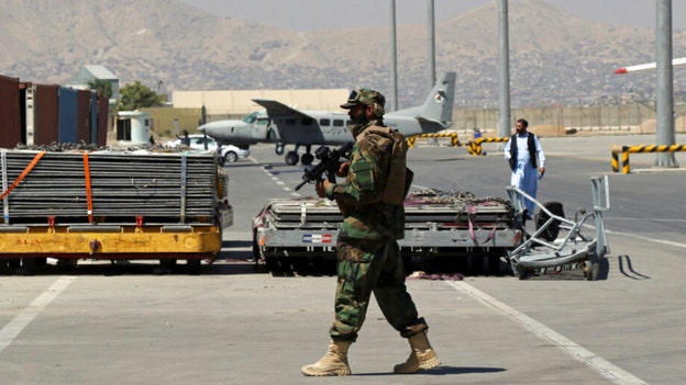 Dozens of Westerners, Americans board commercial flight from Kabul