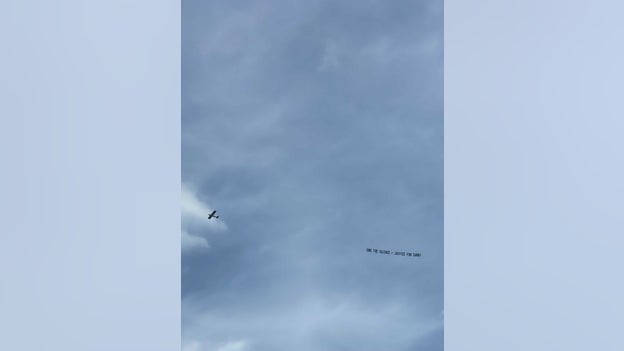 Banner with 'Justice for Gabby' message flies over Laundrie family's home