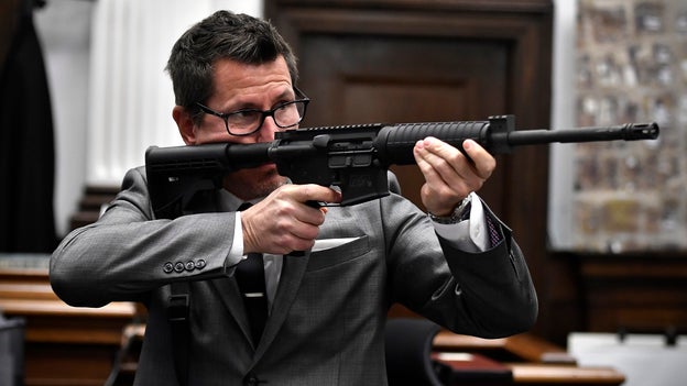 Prosecutor holds AR-15 in court to demonstrate how Rittenhouse held weapon