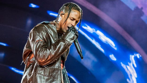 Travis Scott stops music at Astroworld to help fan in new video: 'Everybody needs to step back'