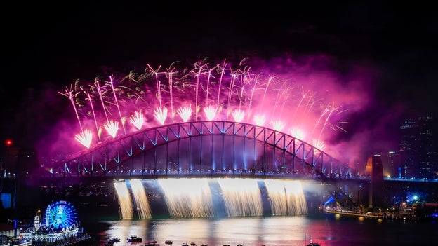 Sydney Harbour Bridge glows during New Year's Eve celebration