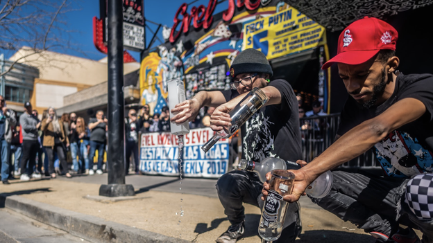 Las Vegas bar owner and patrons pour Russian vodka down the drain in show of support for Ukraine