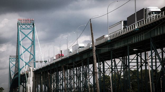 Canadian truckers shut down busiest border crossing in North America, back up Detroit roads