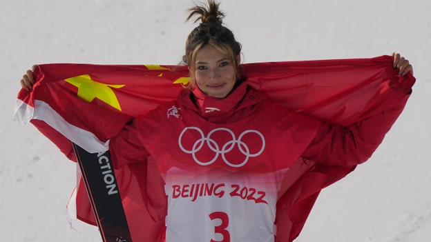 Us-born Chinese freeskier Eileen Gu wins Olympics silver with wafer-thin margin