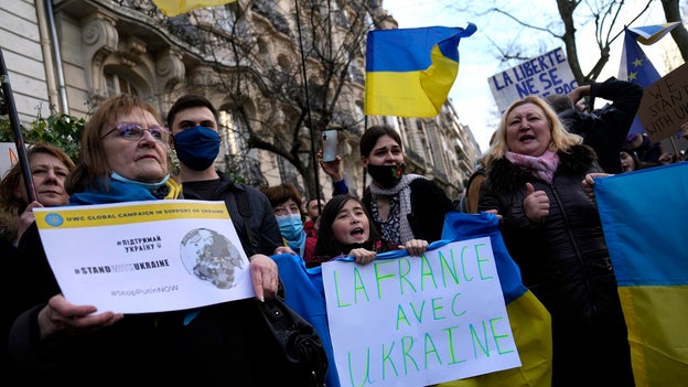 Protesters gather outside Russian embassy in Paris