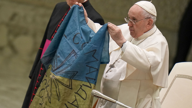 Pope Francis condemns Bucha massacre, kisses Ukrainian flag