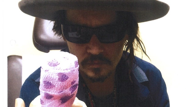 Photo shown of message Johnny Depp scrawled on mirror with bleeding finger