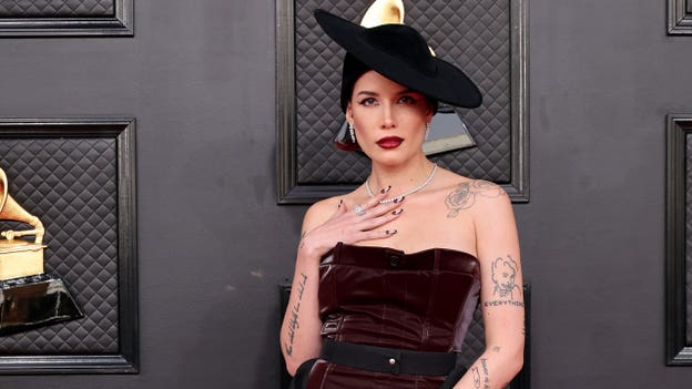 Halsey hits Grammys red carpet days after surgery