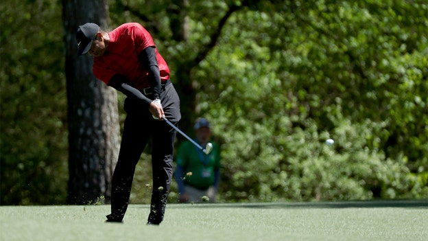 Woods bogeys No. 11 after short chip shot, missed putt