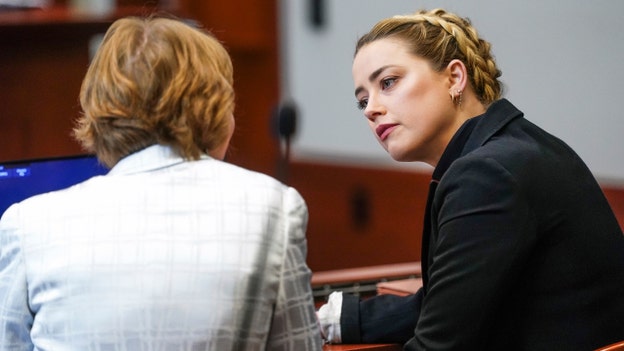 Amber Heard's pal kicked out of courtroom