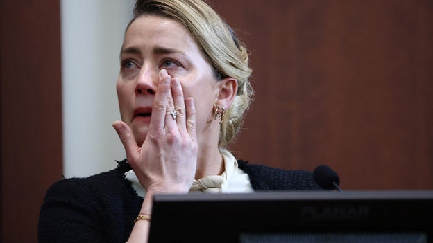 Amber Heard sobs as she recounts alleged sexual assault with liquor bottle