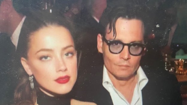 Amber Heard says covered nose injury with makeup