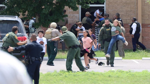 Image shows Uvalde children escaping school shooting