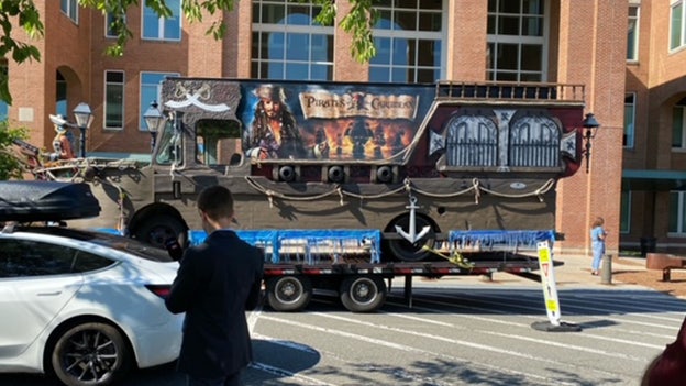Johnny Depp fans drives by courthouse with an elaborate makeshift pirate ship