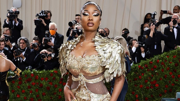 Megan Thee Stallion charges into Met Gala in gown fitted with ‘guilded’ golden feathers