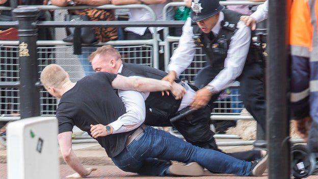 Police chase man who broke through barriers ahead of King Charles III arrival at Buckingham Palace