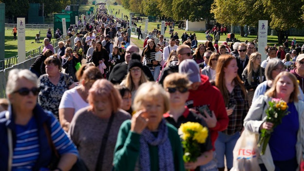 Mourners for the Queen continue to lay flowers outside Windsor Castle