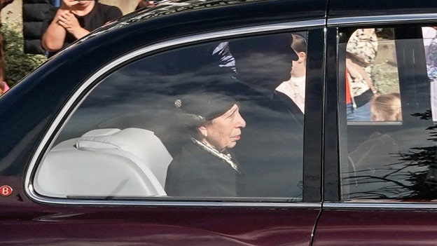Queen Elizabeth II's only daughter, Princess Anne, follows her mother's coffin from Balmoral