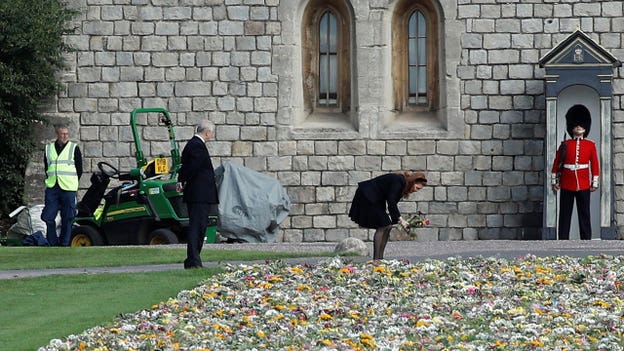 Prince Andrew and Sarah Ferguson, Duchess of York view floral tributes outside Windsor Castle