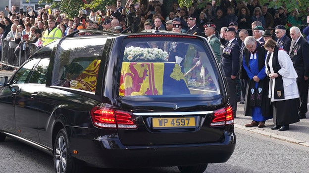 Queen Elizabeth II’s coffin passes through Scottish towns, residents say goodbye