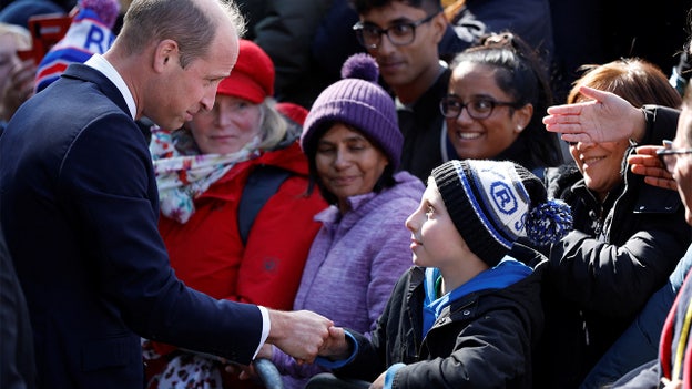 Prince William chats with kids in hours-long queue