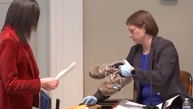 Jurors see sneakers Paul was wearing when he was murdered