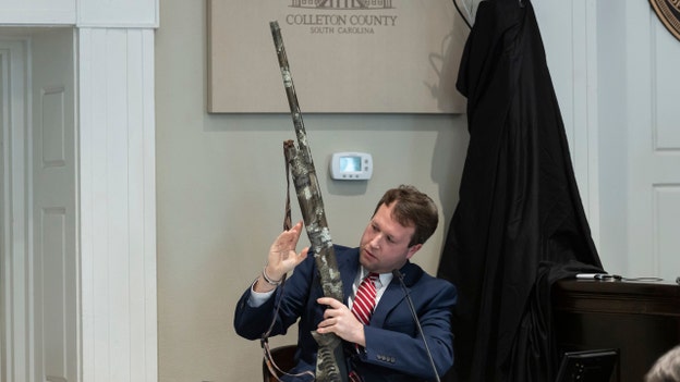 Weapons expert displays shotgun from Murdaugh evidence box