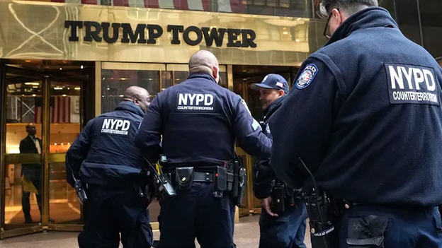 New York police barricade Trump Tower ahead of courtroom surrender