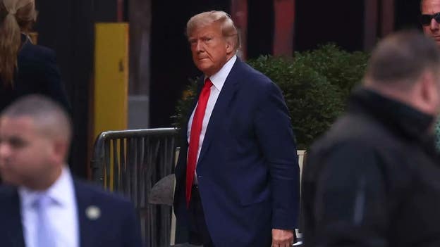 Images released of Trump's historic trip to NYC day before he's set to be arraigned