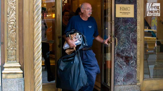 New York detectives seen leaving Rex Heuermann's office with items