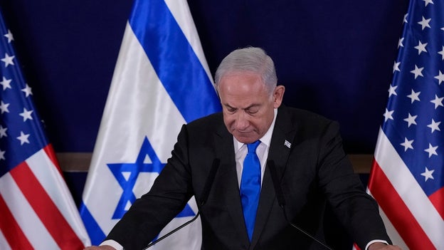 Netanyahu pledges to defeat Hamas at emergency government swearing in