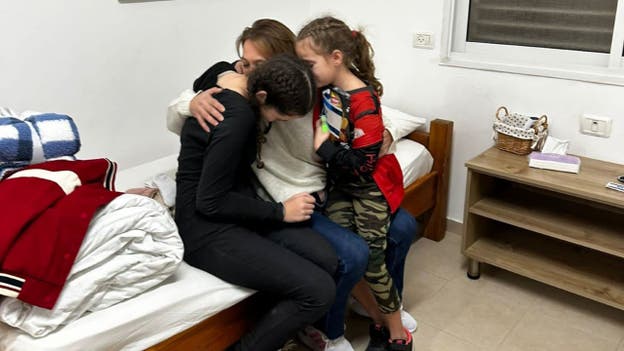 Israel-Hamas war: Maayan Zin embraces two daughters after they were held hostage in Gaza