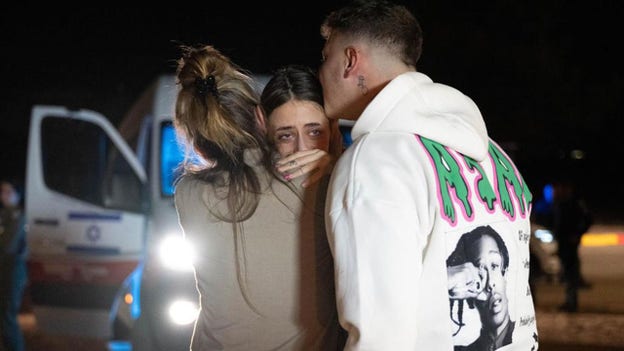 Israel shares images of 2 released hostages back on home soil