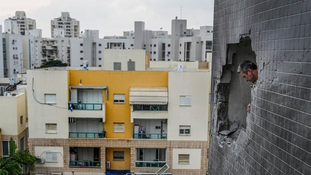 Residential building in Ashkelon is hit by rocket fired from Gaza Strip