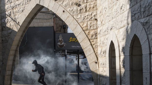 Israel ramps up raids in West Bank city as troops seize weapons, search hundreds of buildings
