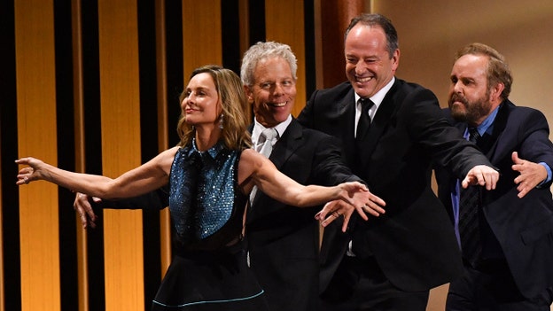 Calista Flockhart and 'Ally McBeal' cast dance on stage at Emmys