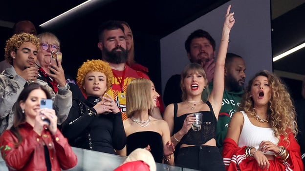 Taylor Swift chugs her drink as she cheers on Travis Kelce in Super Bowl LVIII