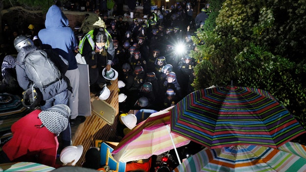 Flashbangs, tear gas deployed as police move to break up UCLA anti-Israel camp