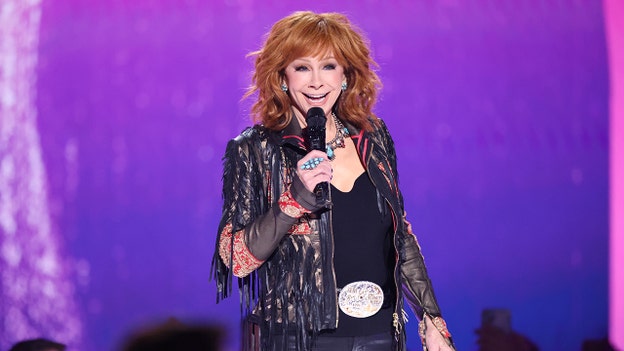 Reba McEntire jokes she's 'been around for awhile' as 17-time ACM host