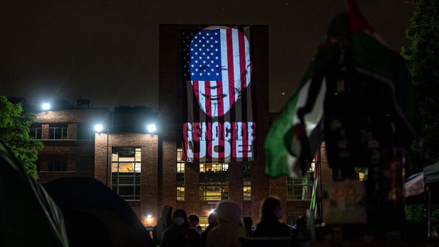 GWU protesters project image of Biden over American flag: 'Genocide Joe'