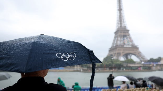 Rainy weather can't dampen Olympic spirit in opening ceremony