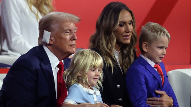 Trump's granddaughter, Carolina, steals show while sitting on her grandfather's lap