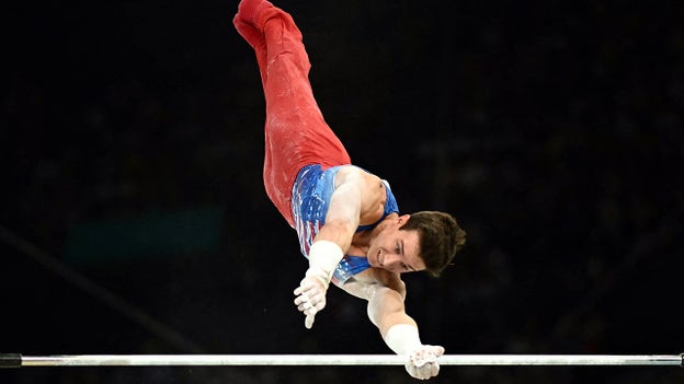 Team USA's Brody Malone struggles on horizontal bars, falls twice