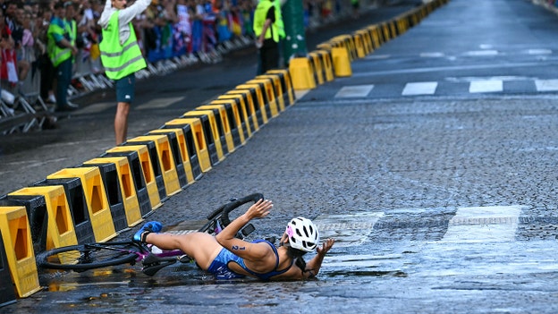 Paris streets littered with bicycle crashes during Olympics triathlon amid wet conditions